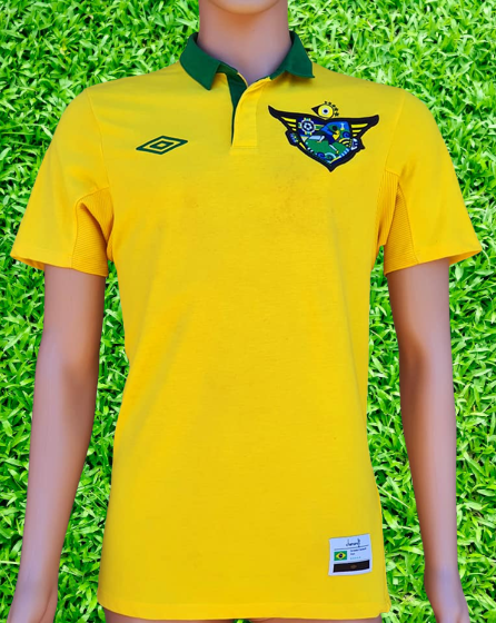 BRAZIL 2010 UMBRO WORLD CHAMPIONS COLLECTION CREST BY FERNANDO CHAMARE –  vintage soccer jersey