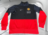 ENGLISH PREMIER MANCHESTER UNITED FC 2009-2010 LEAGUE CUP CHAMPION LINE-UP NIKE JACKET LARGE # 355106-010